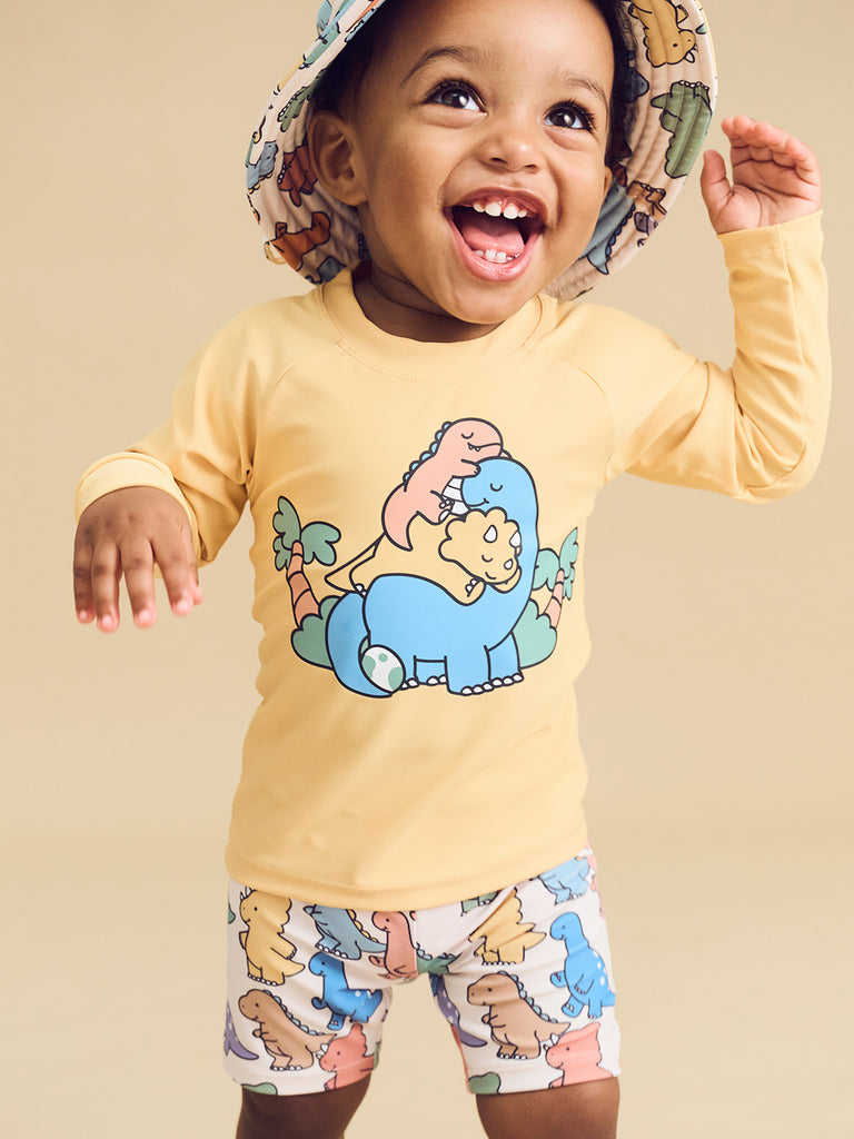 Huxbaby Cuddlesaurus Rashguard - Buttercup